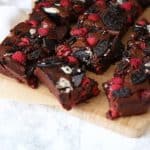 Fudgy, gooey, brownies, with a double layer of Oreos and raspberries. Because fresh fruit cancels out the chocolate, right?! A delicious birthday cake, piled high on a plate or a dessert, served with vanilla ice cream. https://pattern-ward.live