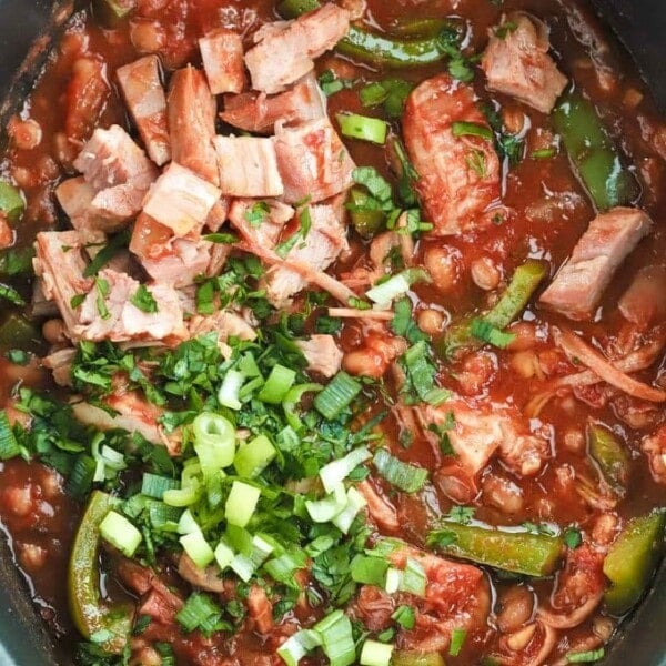 Slow cooker ham joint with beans and tomato sauce.
