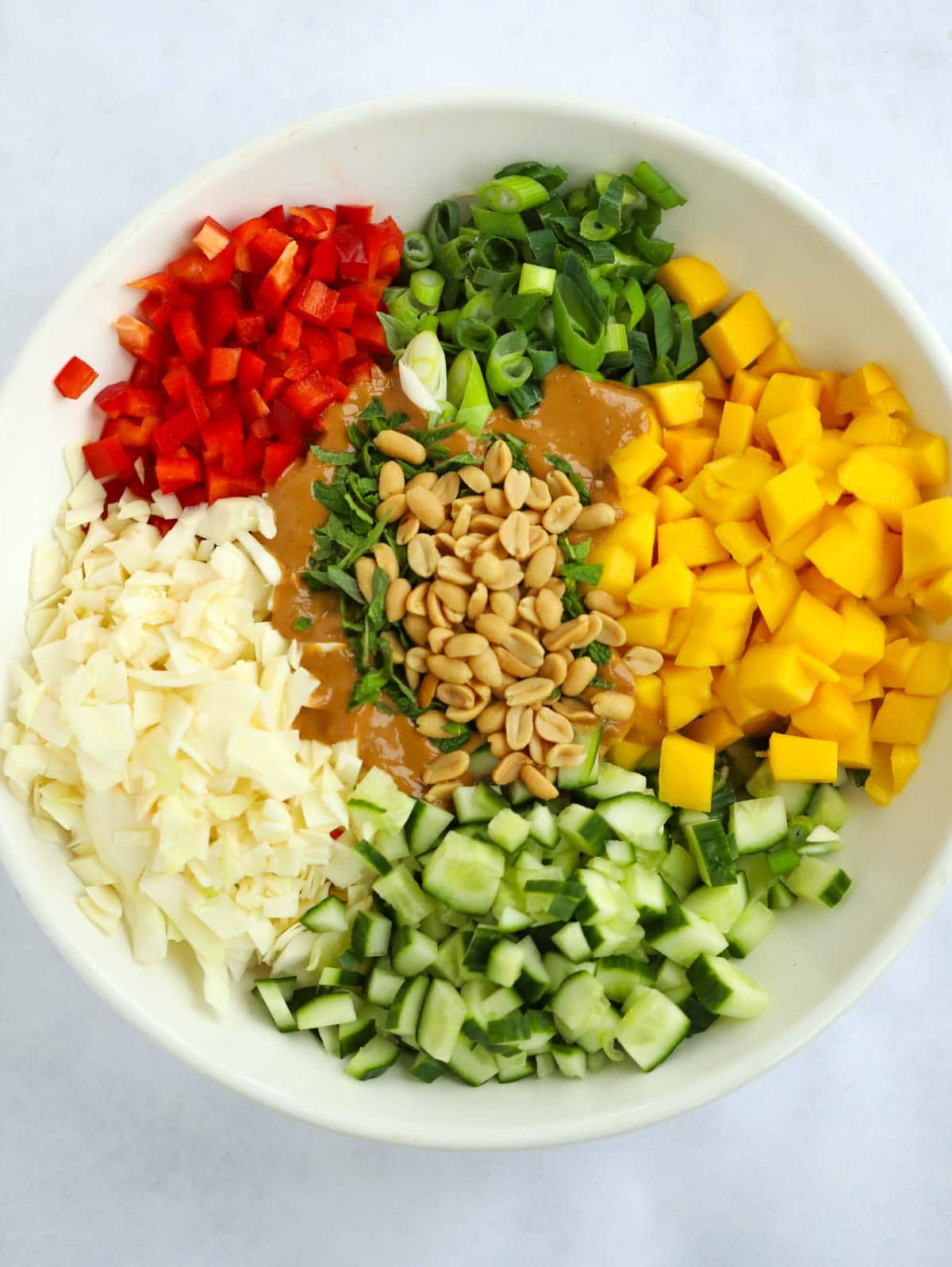 Ingredients for a Thai-style Cabbage Salad with peanut butter salad dressing.