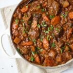 Big pot filled with Irish Beef and Guinness Stew, ready to be served.