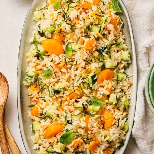 A Rice Salad on a platter on a table, ready to serve.